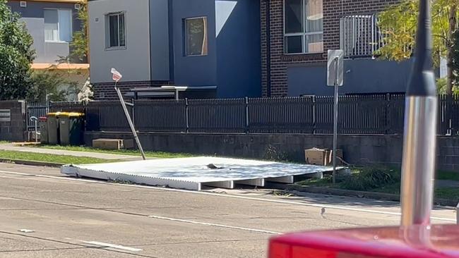 Winds of up to 100km/h have caused an aluminium roof to blow off the top of a building. Picture: TNV