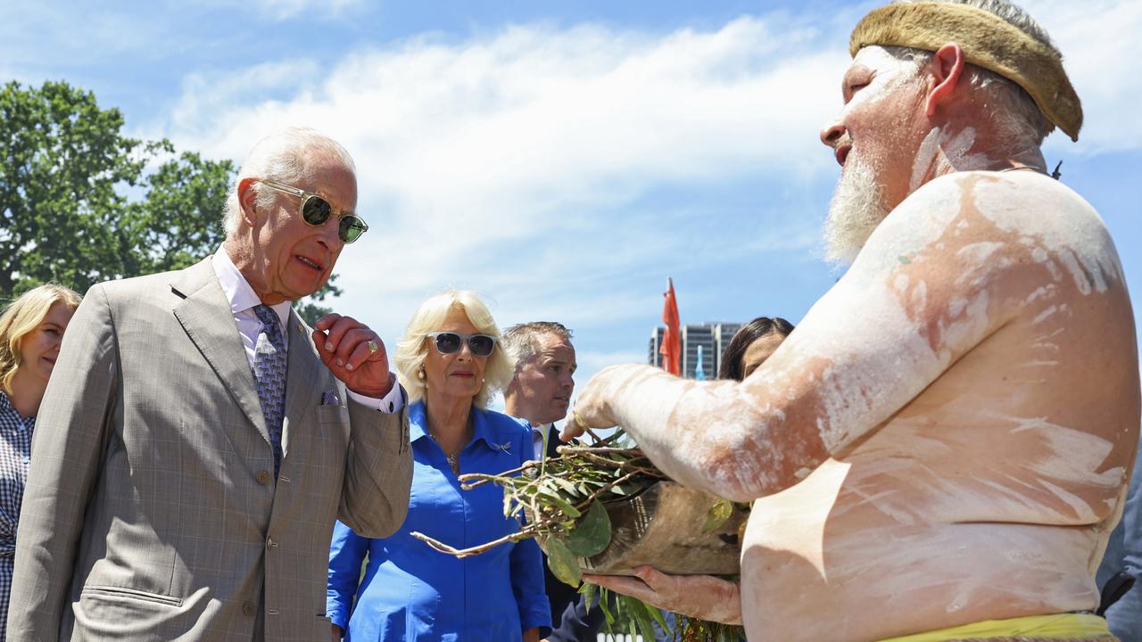 The King and Queen take part in a smoking ceremony during the Premier's Community Barbeque at Parramatta Park. Picture: Toby Melville-Pool/Getty Images