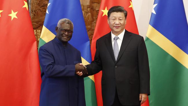 Solomon Islands Prime Minister Manasseh Sogavare visits Xi Jinping in Beijing in 2019. Picture: Getty