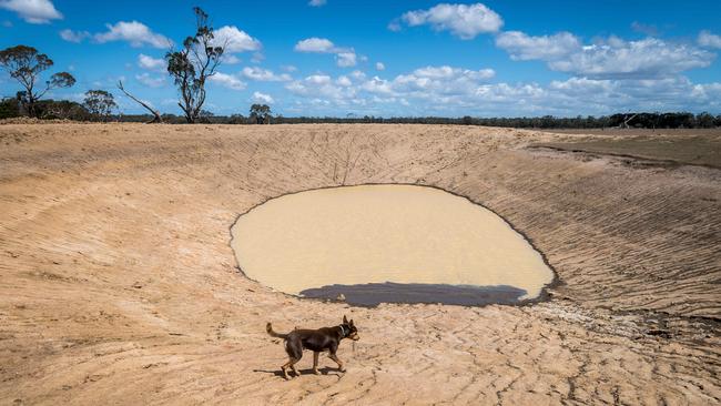 A dam retains little water after recent rain falls on Steve Harrison's property.