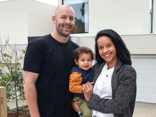 Matt and Jess Chamberlain with their son Miro 18mths,have built two side-by-side townhouses in Templestowe, and while they're moving into one they're holding an auction today for their other townhouse. Picture : Ian Currie