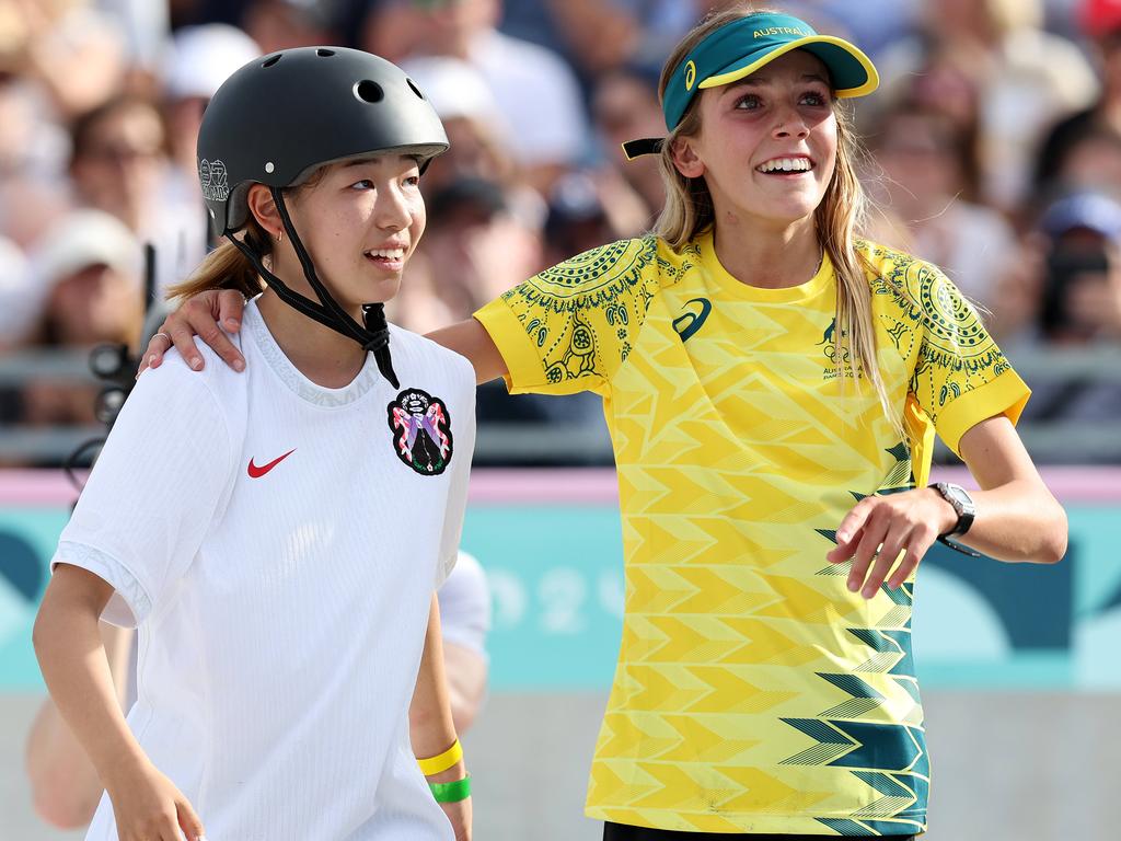 Japan’s Coco Yoshizawa from Japan won gold at the women’s street skateboarding final and Chloe was on hand to congratulate her. Picture: Adam Head