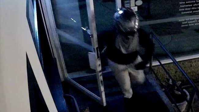 CCTV of suspect in a motorcycle helmet after smashing his way into The Edwards Bar at Newcastle West on February 20.