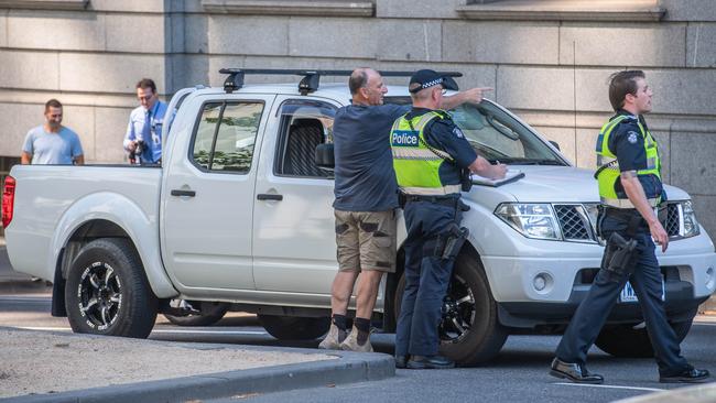 Police speak to witnesses after the incident. Picture: Jason Edwards