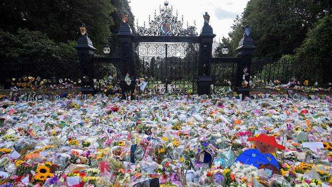 Floral tributes are pictured outside Norwich Gate on the Sandringham Estate. (Photo by TOBY MELVILLE / POOL / AFP)