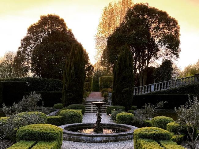 The property features ornamental ponds.