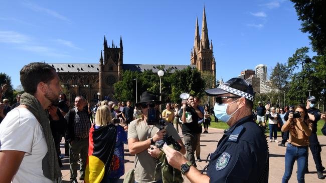 NSW Police speak to a man during a Freedom Day protest in Hyde park, Sydney. Picture: NCA NewsWire/Joel Carrett