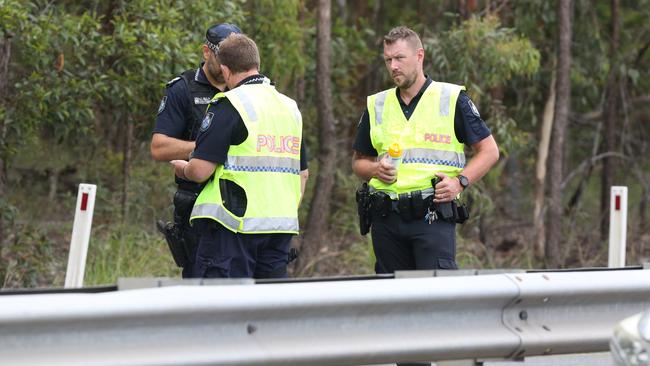 Forensic crash investigators on the scene at Salisbury. Picture: Zak Simmonds