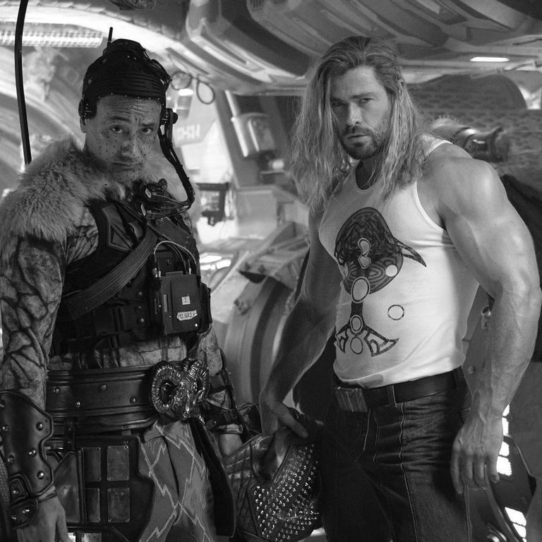 Hemsworth (right) as Thor with director Taika Waititi.