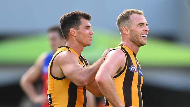 Jaeger O'Meara and Tom Mitchell celebrate a win Picture: Getty Images