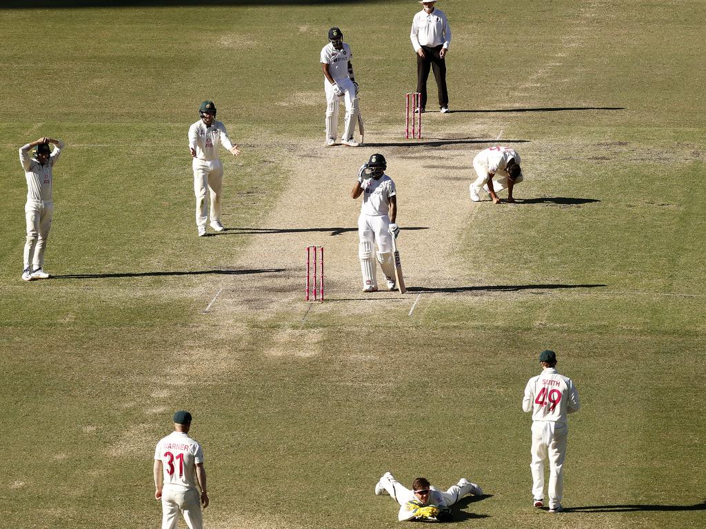 Tim Paine reacts after dropping a catch off the bat of Hanuma Vihari.