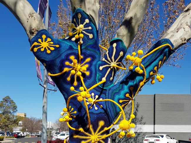 Narelle Mercer took out the theme section of the 2019 Jumpers and Jazz in July Tree Jumper exhibition with this creation titled "Sparks Fly".