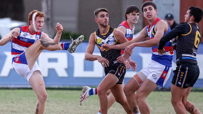 WRFL: Diesel Moloney gets a kick for Point Cook. Picture: George Sal