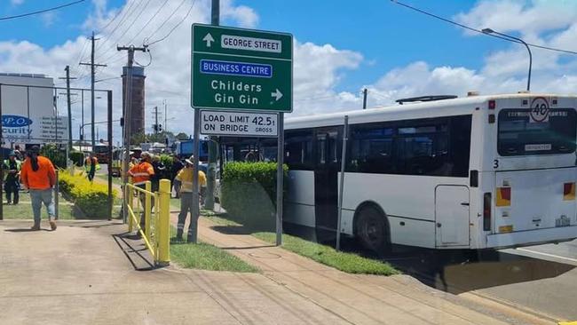 A bus with 26 passengers has crashed into a power poll at a busy Bundaberg intersection.