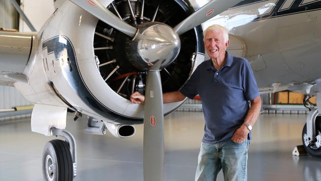 NQ Warbirds director Mike Spaulding was proud to see the upgrades to the Mareeba Airport completed after more than 20 years at his hanger at the airport. He is pictured with a Beech 18, one of his favourite aircraft. PHOTO: Bronwyn Wheatcroft