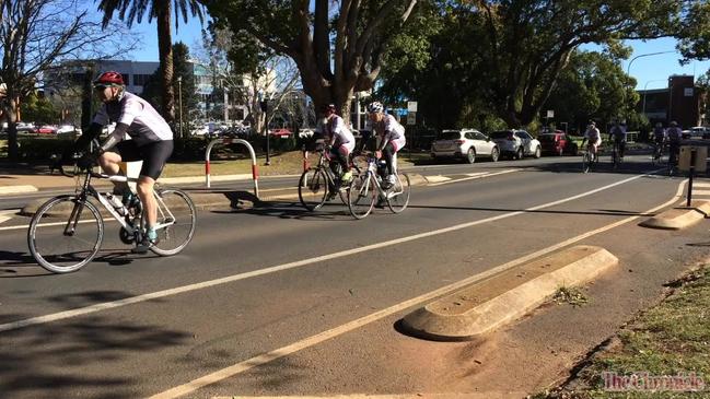 Former PM pedals into city