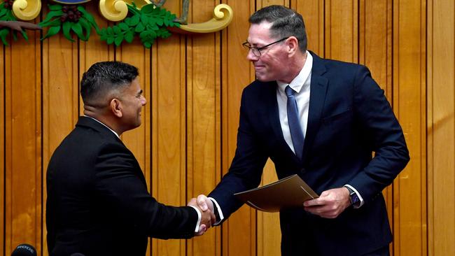 The investiture of newly elected Townsville City Councillors at the council chambers with Townsville City Council CEO Prins Ralston and Mayor Troy Thompson shaking hands. Picture: Evan Morgan