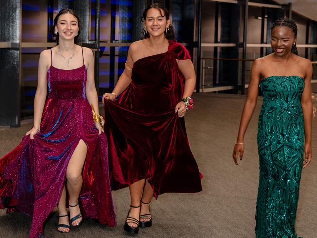 Amelia Espie, Valerie Balu and Taya-Mai Ducay at the Year 12 School formals of NT Christian College at Darwin Convention Centre, Darwin. Picture: Pema Tamang Pakhrin.