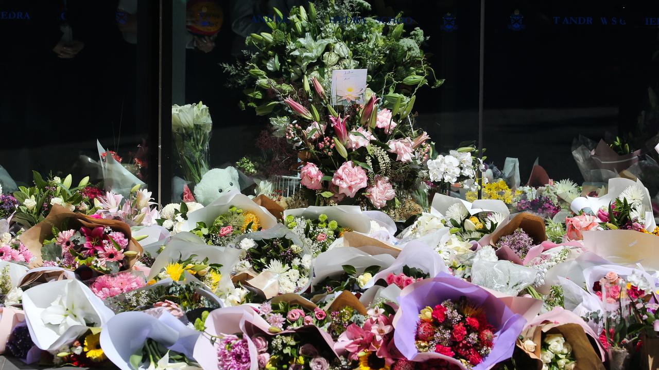 Flowers left in honour of teacher Lilie James outside the St Andrews School in Sydney after she was murdered by her former partner. Photo by: NCA Newswire /Gaye Gerard