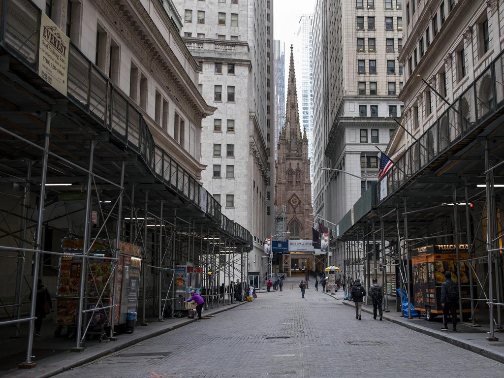 Pedestrian traffic is light along Wall Street in Lower Manhattan in New York. Picture: AP