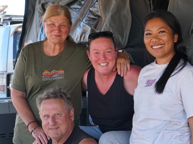 Department of Child Protection workmates (back) Ruth Frick, Kylie Huppatz, Tiara Ladju and (front) Rick Carrick camping at the Birdsville Races. Picture: Jessica Ball