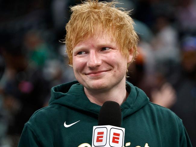 BOSTON, MASSACHUSETTS - MAY 23: Singer Ed Sheeran reacts prior to a game between the Indiana Pacers and Boston Celtics during the first quarter in Game Two of the Eastern Conference Finals at TD Garden on May 23, 2024 in Boston, Massachusetts. NOTE TO USER: User expressly acknowledges and agrees that, by downloading and or using this photograph, User is consenting to the terms and conditions of the Getty Images License Agreement.   Winslow Townson/Getty Images/AFP (Photo by Winslow Townson / GETTY IMAGES NORTH AMERICA / Getty Images via AFP)