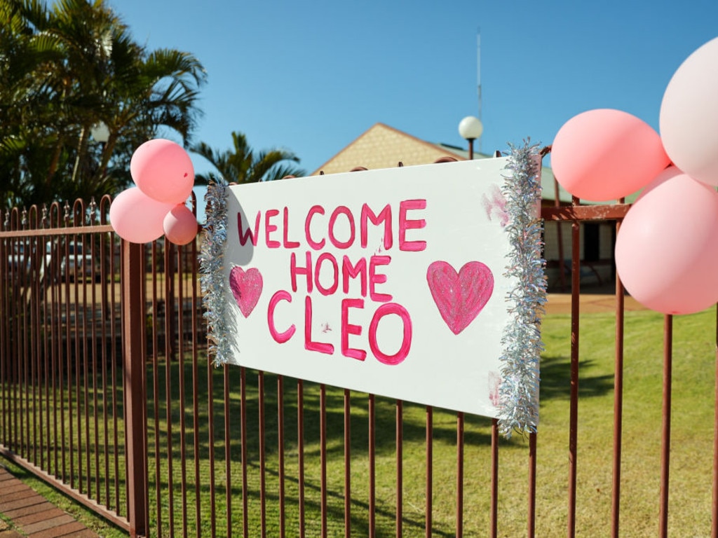 A sign is seen on a fence in celebration of the finding of Cleo Smith in Carnarvon.