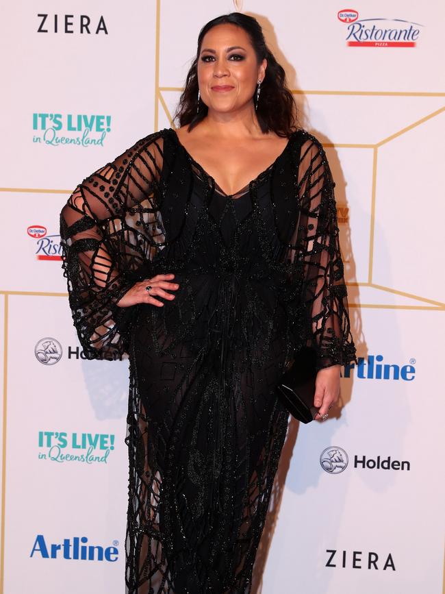 Singer Kate Ceberano showing off her glitzy flare sleeved black gown. Picture: Chris Hyde/Getty Images