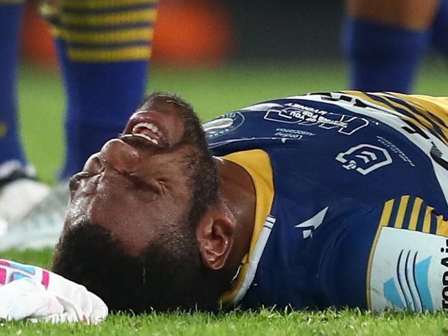 GOLD COAST, AUSTRALIA - AUGUST 21: Maika Sivo of the Eels receives attention on the field during the round 23 NRL match between the Parramatta Eels and the North Queensland Cowboys at Cbus Super Stadium, on August 21, 2021, in Gold Coast, Australia. (Photo by Chris Hyde/Getty Images)