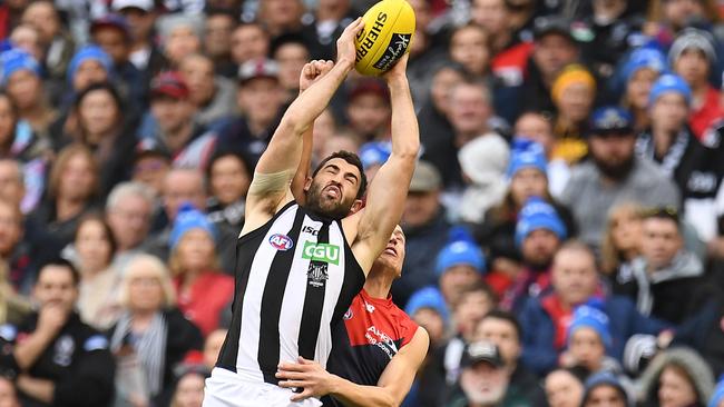 Alex Fasolo marks against Melbourne in Round 12.