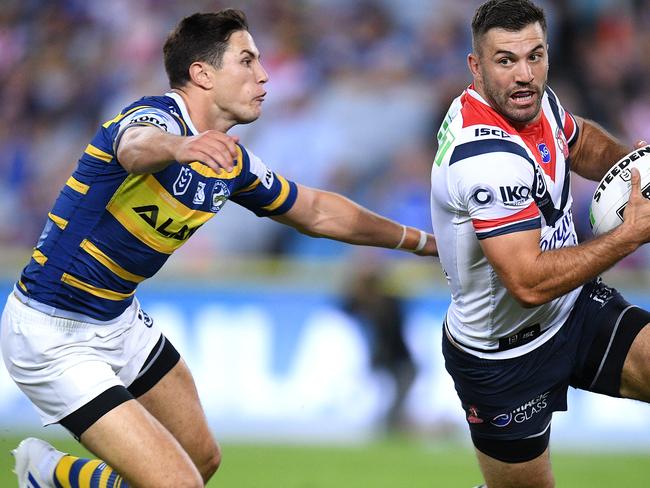 James Tedesco of the Roosters is tackled in goal by Mitchell Moses of the Eels during the Round 3 NRL match between the Parramatta Eels and Sydney Roosters at ANZ Stadium, Sydney, Friday, March 29, 2019. (AAP Image/Dan Himbrechts) NO ARCHIVING, EDITORIAL USE ONLY