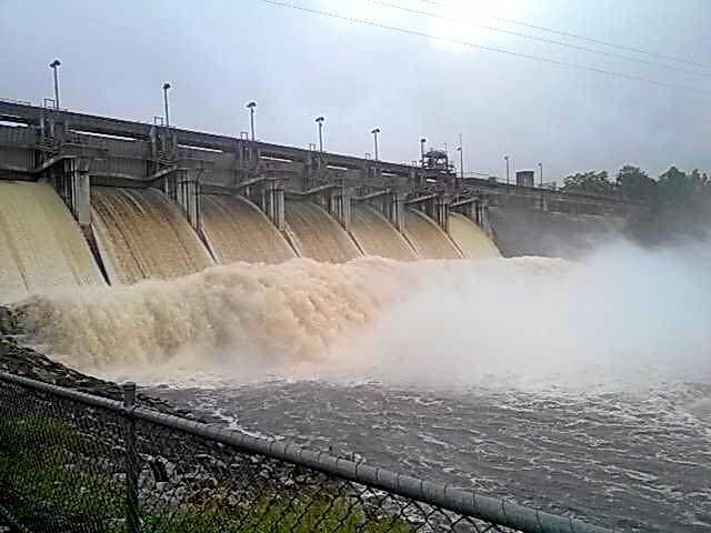 Water rushes from the dam after floods in 2011. Picture: Donna Cecil