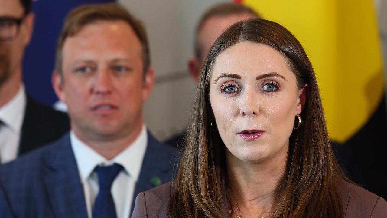 Housing, Local Government, Planning and Public Works Minister Meaghan Scanlon is watched by Premier Steven Miles. Picture: NCA NewsWire/Tertius Pickard