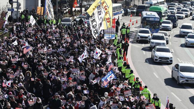 South Korean President Yoon Suk Yeol’s rally near the presidential residence. Picture: Getty Images.