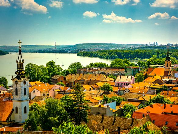 Beautiful view over sunny orange roofs of Zemun quarter and Danube river in summer, Serbia.