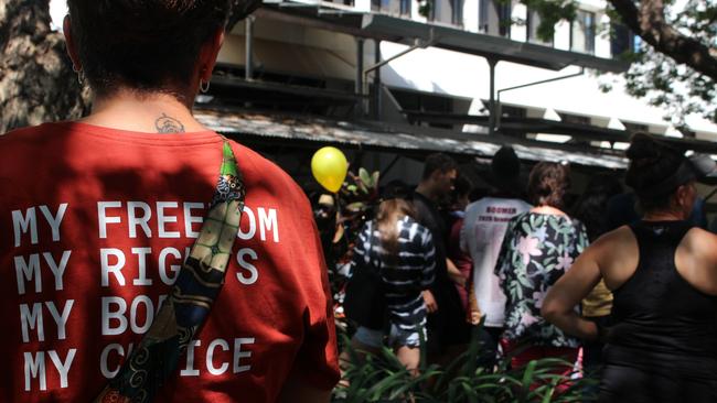 Anti coronavirus vaccine protesters rally near the Smith St Mall in Darwin on Saturday. Picture: Jason Walls