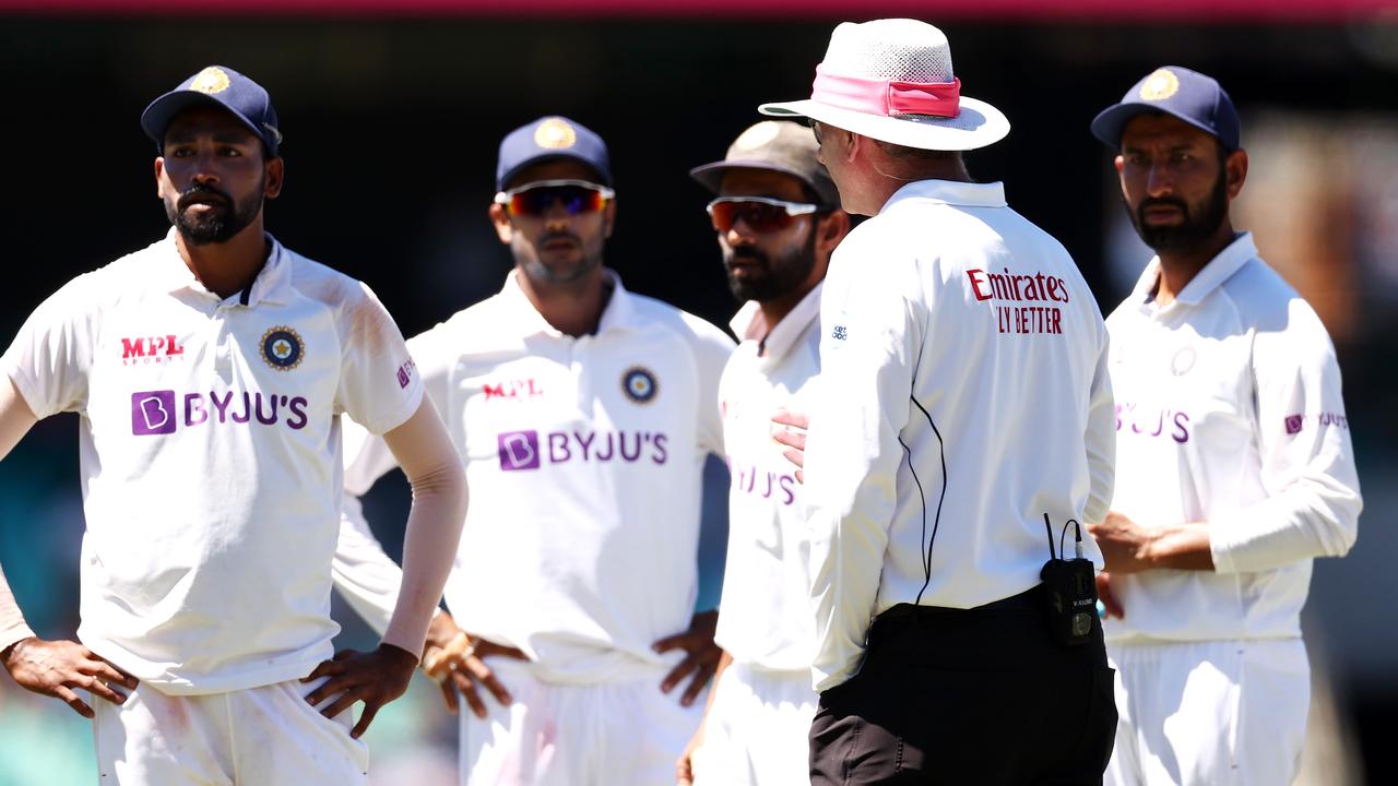 Mohammed Siraj of India and teammates look at spectators following a complaint made by Siraj about the crowd hurling racist abuse. Picture: Cameron Spencer/Getty Images.