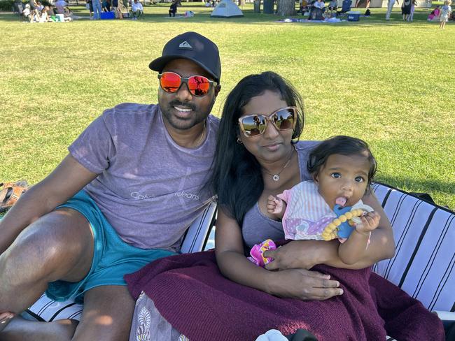 Sentil Raj and his family at Williamstown Foreshore for the 2024 New Year's Eve fireworks. Picture: Erin Constable