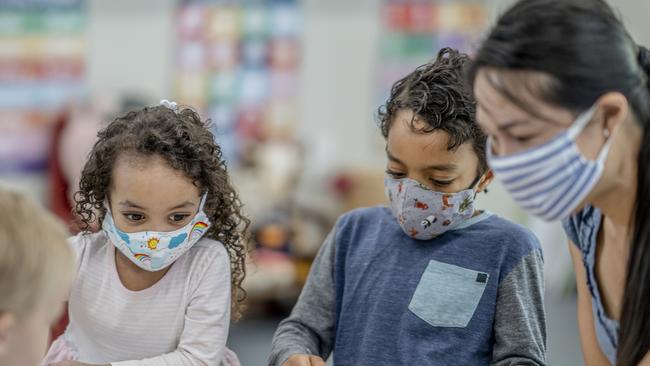 Some parents have called for young students to wear masks when they return to Queensland schools in 2022.