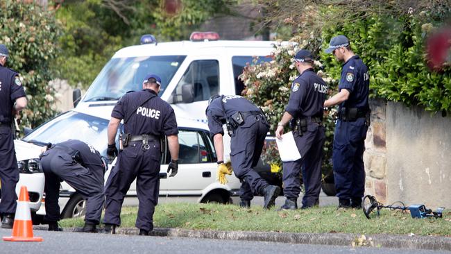 Police at the scene after the murder of Michael McGurk. Picture: Jeff Herbert