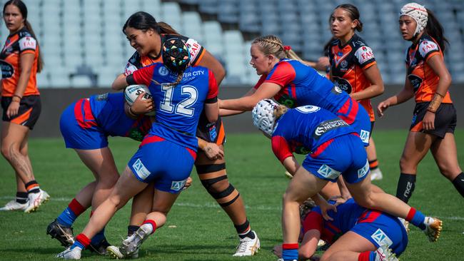 Sofaia Vaki hits it up for Wests Tigers in last season’s Tarsha Gale Cup. Picture: Thomas Lisson