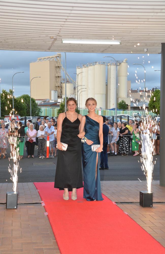 Toowoomba school formals. At the 2023 St Ursula's College formal is graduate Alexandra See (right) with her partner Siane Lea. Picture: Rhylea Millar