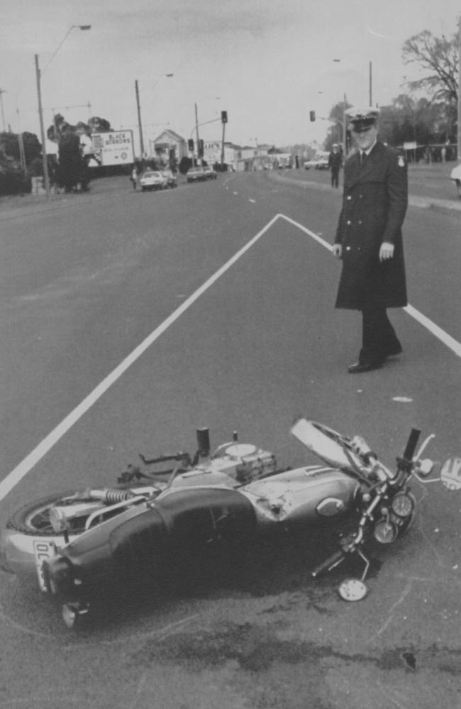 A motorbike lies on Hoddle Street, its rider one of those shot dead by Knight.