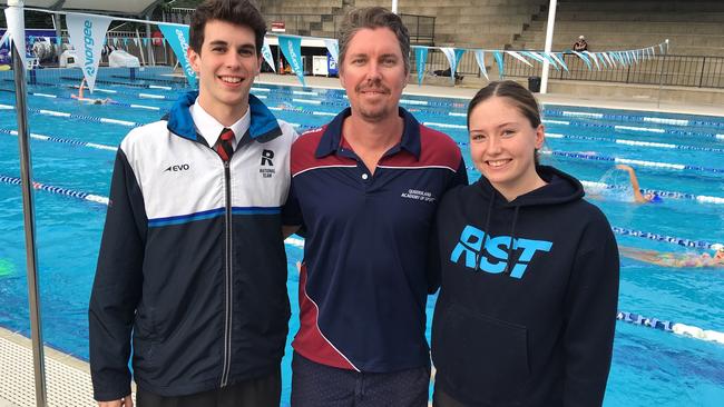 Tom Neill and Bronte Job flank their coach Damien Jones at Rackley Centenary. Job also went to the world juniors, where she won gold.