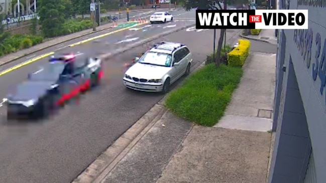 Moments unmarked cop car and motorbike collide