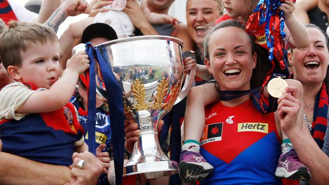 Daisy Pearce of the Demons celebrates with family during the 2022 AFLW Grand Final. Picture: Dylan Burns/AFL Photos via Getty Images.