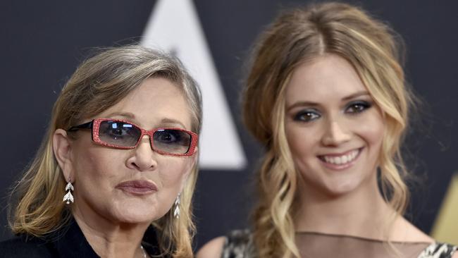 Billie Lourd (right) is expected to inherit all of her mother Carrie Fisher’s fortune. Picture: Jordan Strauss/Invision/AP, File