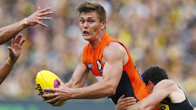 GWS defender Adam Tomlinson is being chased by St Kilda and Collingwood. Photo: Michael Klein