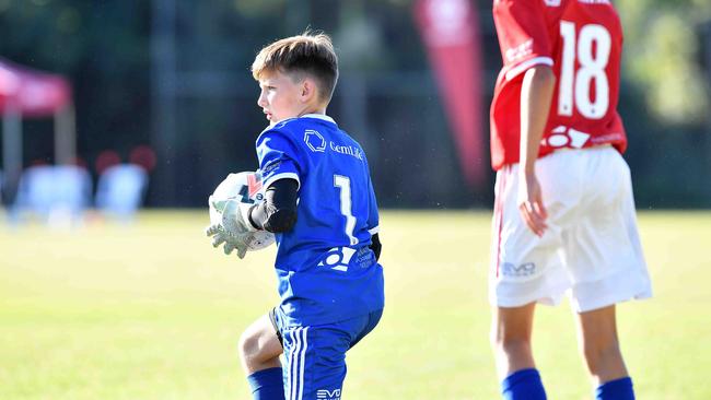 SOCCER: Junior football carnival, Maroochydore. Gold Coast Knights (red) V Moreton Bay United, boys. Picture: Patrick Woods.