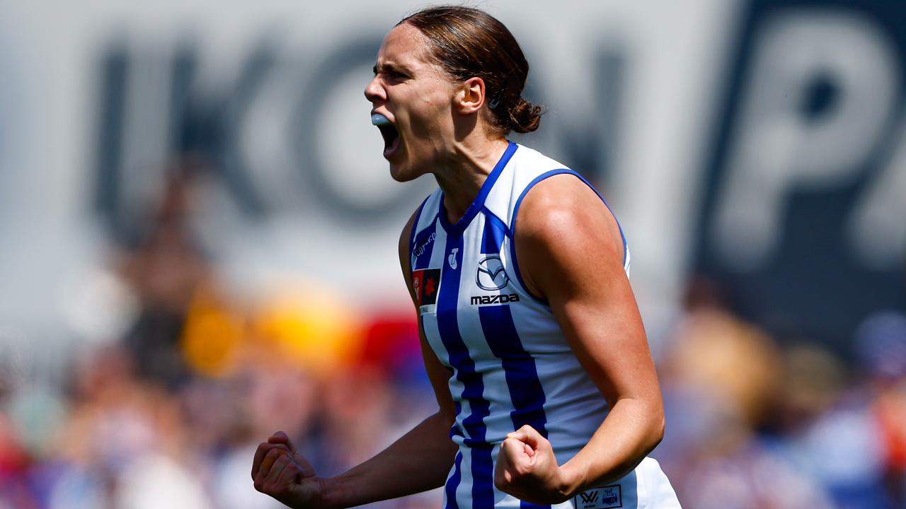 MELBOURNE, AUSTRALIA - DECEMBER 03: Jasmine Garner of the Kangaroos celebrates a goal during the 2023 AFLW Grand Final match between The North Melbourne Tasmanian Kangaroos and The Brisbane Lions at IKON Park on December 03, 2023 in Melbourne, Australia. (Photo by Dylan Burns/AFL Photos via Getty Images)